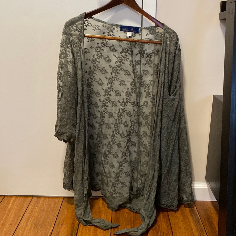 Embroidered see through lace cover. Perfect for the beach or over any tank
